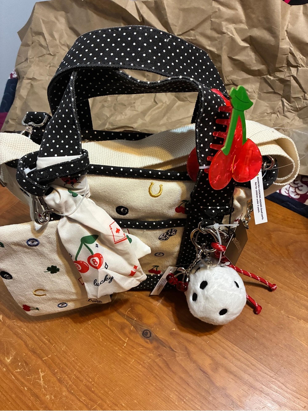 Madden Girl Cream Canvas Tote with Black Polka-Dot Trim and Red Cherry Charm